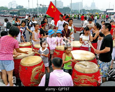 Cheerleaders prepared to beat drums for cheering 2008 Beijing Olympic Torch relay on Aug.06 in China. Stock Photo