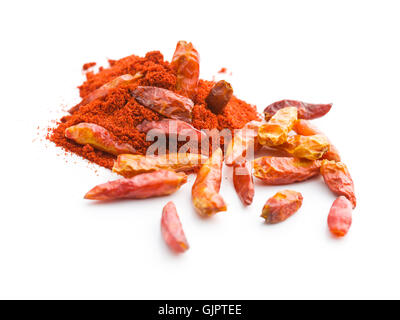 Chili peppers and powdered pepper isolated on white background. Stock Photo