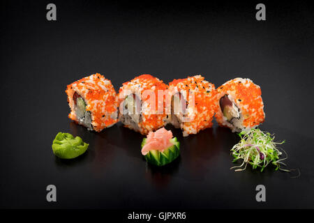 Delicious Sushi set.Uramaki sushi rolls decorated with caviar Stock Photo