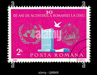 Postage stamp from Romania depicting the United Nations headquarters building in New York City, 30'th anniversary of the UN.