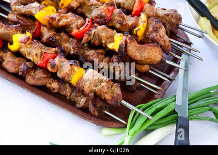 skewers of mixed meat on party tab Stock Photo