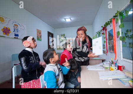 Jalalabat, Kyrgyzstan: In a center for mentally and physically disabled children,kids receive learning, speech, creative therapy Stock Photo