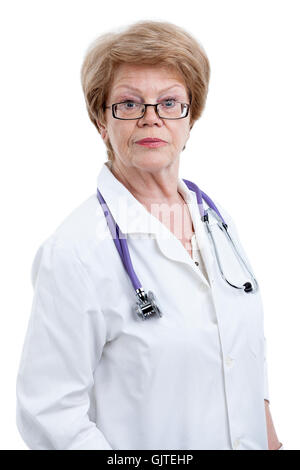 Serious doctor in a white coat with a stethoscope around her neck, looking at camera, isolated on white background Stock Photo