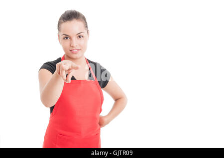 Attractive female supermarket seller supervising you or doing I'm wathcing you gesture isolated on white with copyspace Stock Photo