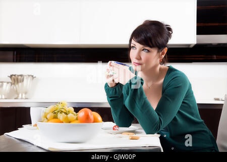 woman cup house Stock Photo