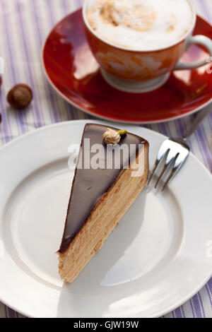 chocolate hazelnut cake,cappuccino Stock Photo
