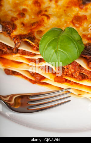 lasagna on a white plate Stock Photo