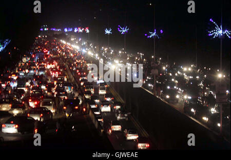 Numerous vehicles are stuck in traffic jam as traffic jam is becoming a routine due to negligence of traffic police staffs at Jail road in Lahore on Wednesday, August 17, 2016. Stock Photo