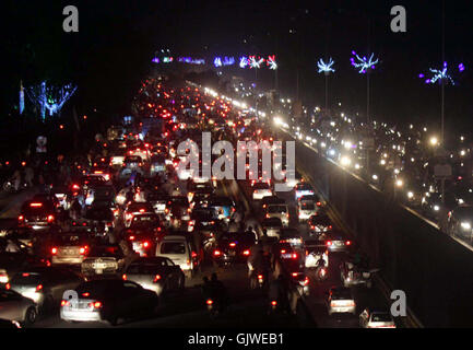 Numerous vehicles are stuck in traffic jam as traffic jam is becoming a routine due to negligence of traffic police staffs at Jail road in Lahore on Wednesday, August 17, 2016. Stock Photo