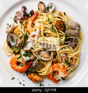 Seafood pasta Spaghetti with Clams, Prawns, Seafood Cocktail close up Stock Photo