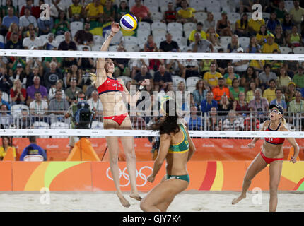 USA's Kerri Walsh Jennings (left) in action against Brazil during the Women's Bronze Medal Match at the Beach Volleyball Arena on the twelfth day of the Rio Olympic Games, Brazil. Stock Photo