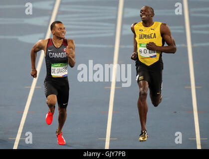 Canada's Andre De Grasse (left) and Jamaica's Usain Bolt compete in the second Men's 100m semi final at the Olympic Stadium on the twelfth day of the Rio Olympic Games, Brazil. Picture date: Wednesday August 17, 2016. Photo credit should read: Mike Egerton/PA Wire. EDITORIAL USE ONLY Stock Photo