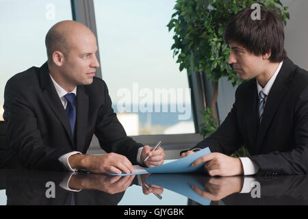 businessmen conversation between two Stock Photo