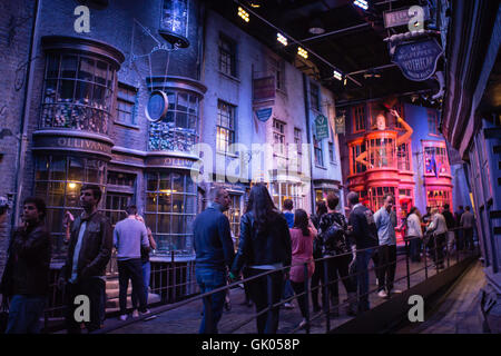 Diagon Alley with visitors in Harry Potter World Warner Bros Studio Tour Leavesden Watford, UK Stock Photo