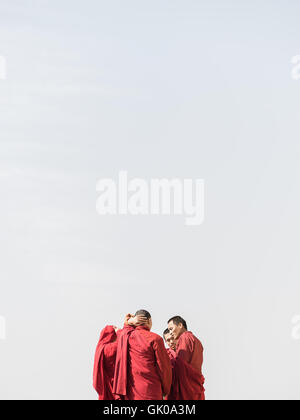 Monks converse in Lukla, Nepal Stock Photo