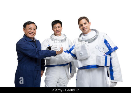 Studio shot male astronauts and engineers Stock Photo