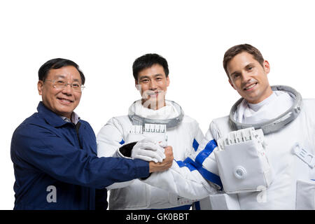 Studio shot male astronauts and engineers Stock Photo