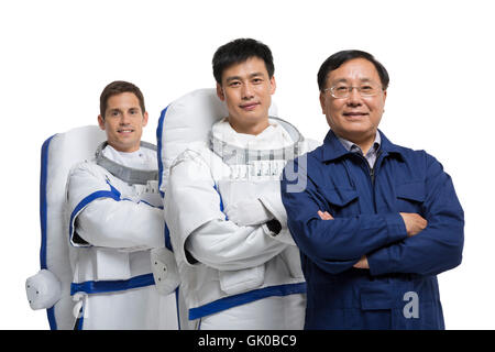 Studio shot male astronauts and engineers Stock Photo