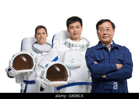 Studio shot male astronauts and engineers Stock Photo