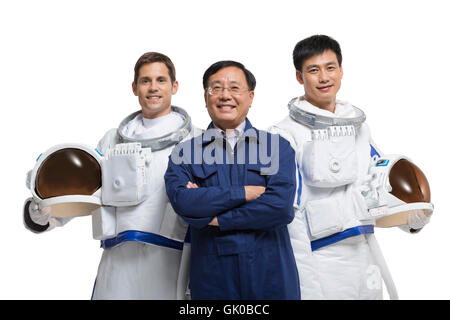 Studio shot male astronauts and engineers Stock Photo