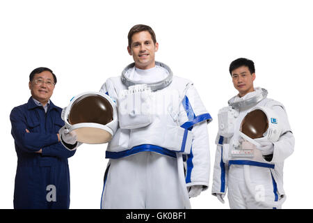 Studio shot male astronauts and engineers Stock Photo