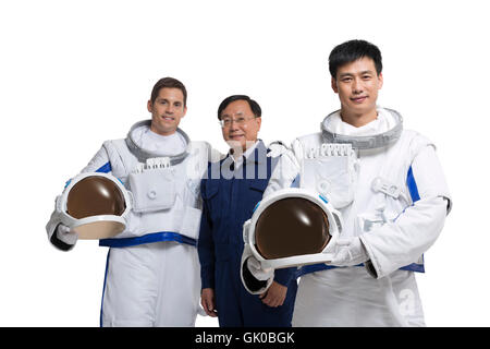 Studio shot male astronauts and engineers Stock Photo