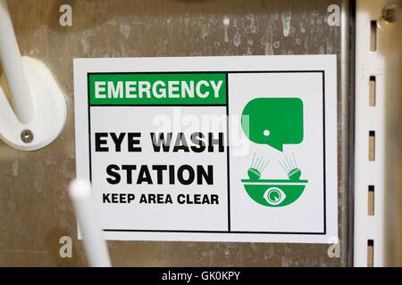 Emergency eye wash station sign in laboratory. Stock Photo