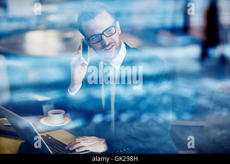 Working at cafe Stock Photo