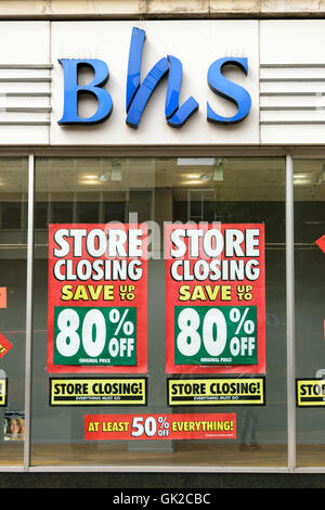 Exeter, Devon, United Kingdom - August 17, 2016: Store closing signs in the window of BHS (British Home Stores) store. Stock Photo