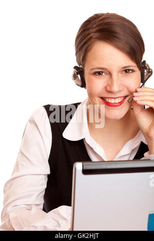 cheerful woman on the phone with headset Stock Photo