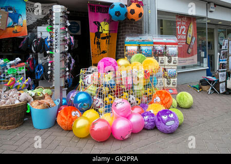 Beach novelties on sale outside a shop in Newquay, Cornwall. Stock Photo