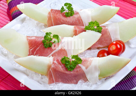 honeydew melon and parma ham Stock Photo