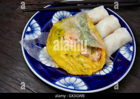 Vietnamese Crispy Pancake (Banh Xeo) and Spring Rolls.  Hoi An, Quang Nam Province, Vietnam. Stock Photo