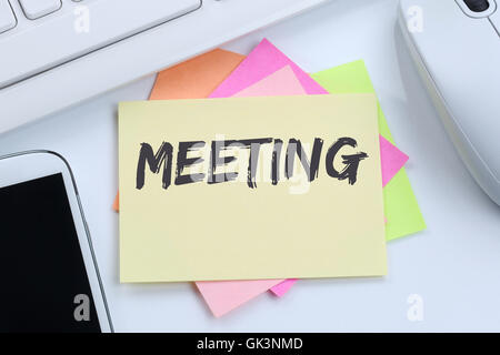 Meeting appointment business team desk computer keyboard Stock Photo