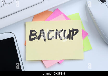 Backup save data on computer technology desk computer keyboard Stock Photo