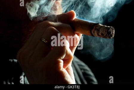 smoking cigar Stock Photo