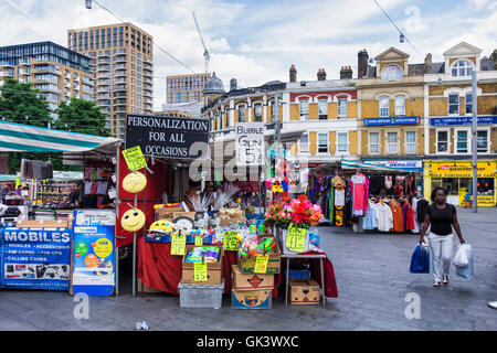 Market stalls and shops in Beresford Square, Woolwich, London Stock Photo