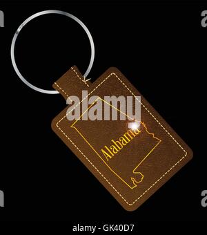 A brown leather key fob and ring with the USA state of Alabama map outline Stock Vector