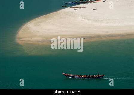 25 Mar 2007, Lang Co, Vietnam --- Sampan Traveling by Lang Co Beach --- Image by © Jeremy Horner Stock Photo