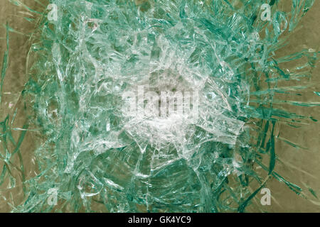 Bulletproof glass after the shooting with traces of bullets, test Stock Photo