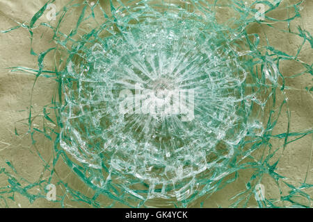 Bulletproof glass after the shooting with traces of bullets, test Stock Photo