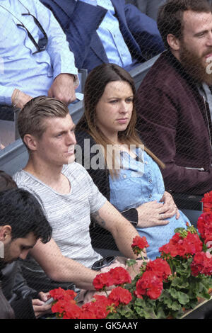 Toni Kroos and his pregnant wife Jessica Farber attend the Mutua Madrid Open at Caja Magica  Featuring: Toni Kroos, Jessica Farber Where: Madrid, Spain When: 05 May 2016 Stock Photo