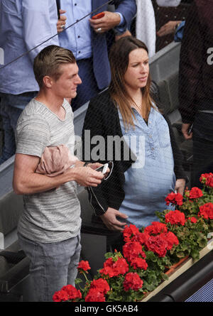 Toni Kroos and his pregnant wife Jessica Farber attend the Mutua Madrid Open at Caja Magica  Featuring: Toni Kroos, Jessica Farber Where: Madrid, Spain When: 05 May 2016 Stock Photo