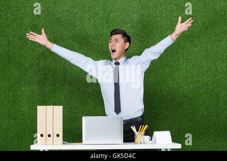 Grassland business men using laptop Stock Photo