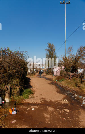 JOHANNESBURG, SOUTH AFRICA - JUNE 22,, 2014: Water tap point on street of township soweto Stock Photo