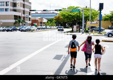 Miami Florida,Coral Way,27th Avenue,street,intersection,crossing,red light,car cars,traffic,Hispanic Latin Latino ethnic immigrant immigrants minority Stock Photo