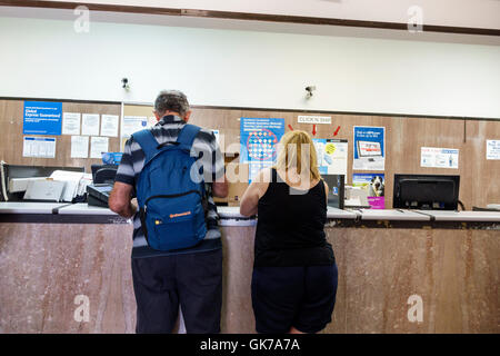 Female United States Postal Service Carrier Delivering Mail In Stock Photo Alamy