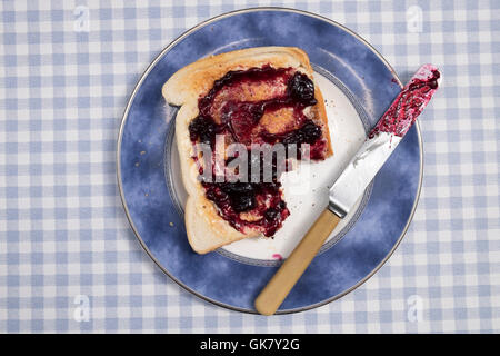 Wild blueberry jam on toast Stock Photo