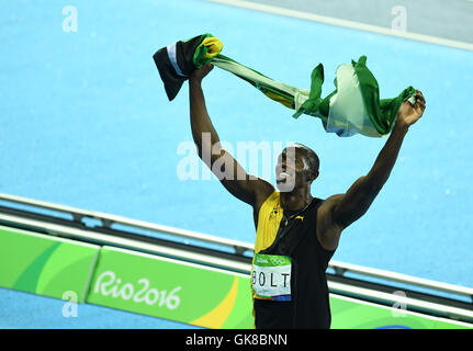 Rio De Janeiro, Brazil. 19th Aug, 2016. Jamaica's Usain Bolt celebrates after the men's 4x100m relay final of Athletics at the 2016 Rio Olympic Games in Rio de Janeiro, Brazil, on Aug. 19, 2016. Jamaica won the gold medal. Credit:  Yin Bogu/Xinhua/Alamy Live News Stock Photo