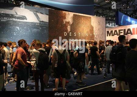 Cologne, Germany. 18th Aug, 2016. Visitors queue for the Game Destiny at the Gamescom fair. Gamescom the Worlds largest Gaming Fair. Gamescom is a trade fair for video games held annually at the Koelnmesse in Cologne. It is organised by the BIU. Credit:  Maik Boenisch/Pacific Press/Alamy Live News Stock Photo